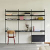 _0002_Pier_System_23_PS_black_powder_coated_steel_black_anodised_profiles_Result_Armchair_oak_seat_tomato_red_armrest_an.jpg