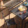 HAY-_0005_Palissade_Dining_Bench_wo_Armrest_Palissade_Chair_anthracite_Glass_Jug-1.jpg